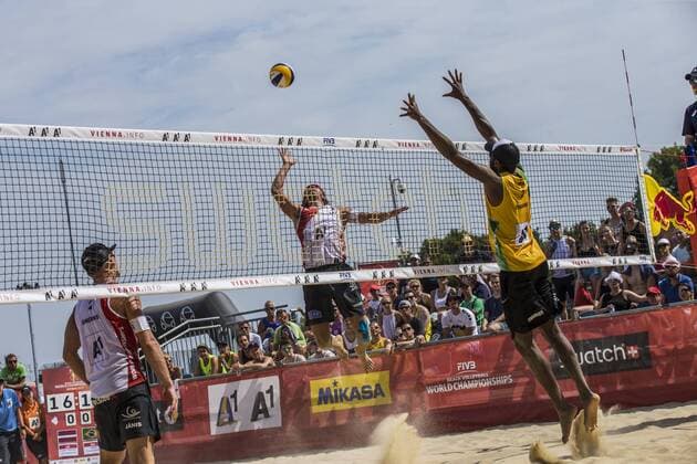 VIENNA, AUSTRIA - AUGUST 04: Aleksandrs Samoilovs of Latvia competes against Evandro Goncalves Oliveira Junior of Brazil during Day 8 of the FIVB Beach volleyball Beachvolleyball World Championships 2017 on August 4, 2017 in Vienna, Austria. (Photo by Michael Kunkel Hoch Zwei) Vienna Austria xHOCHxZWEIx
