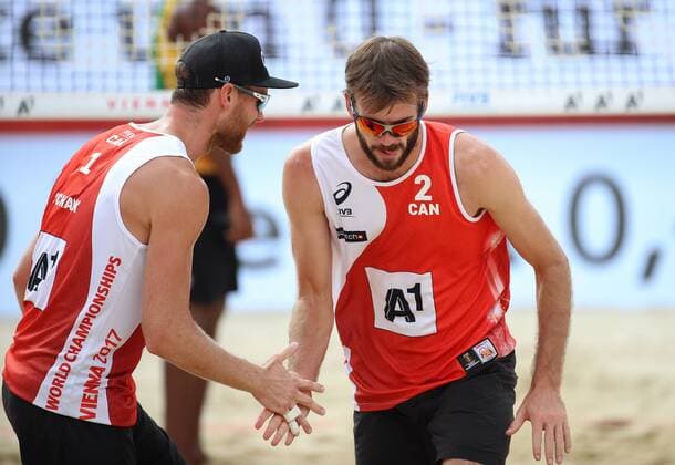 Beach volleyball Beachvolleyball - FIVB World Championships 2017 VIENNA,AUSTRIA,05.AUG.17 - BEACH VOLLEYBALL - FIVB World Championships. Image shows Chaim Schalk and Ben Saxton (CAN). GEPAxpictures xChristianxWalgram