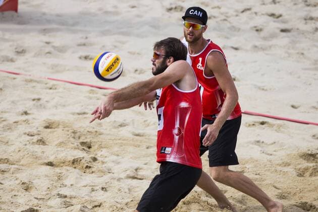VIENNA, AUSTRIA - AUGUST 05: Ben Saxton and Chaim Schalk of Canada in action during Day 9 of the FIVB Beach volleyball Beachvolleyball World Championships 2017 on August 5, 2017 in Vienna, Austria. (Photo by Michael Kunkel Hoch Zwei) Vienna Austria xHOCHxZWEIx