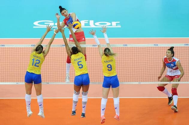 (From left)Natalia Pereira, Adenizia Da Silva, and Roberta Silva Ratzke of Brazil spike against Tijana Boskovic of Serbia during their match of the FIVB Volleyball World Grand Prix Finals 2017 in Nanjing city, east China s Jiangsu province, 5 August 2017. Brazil defeated Serbia 3-1 (20-25, 25-23, 25-14, 25-23). Brazil eliminates Serbia at FIVB Volleyball World Grand Prix Finals 2017  20170805_80262