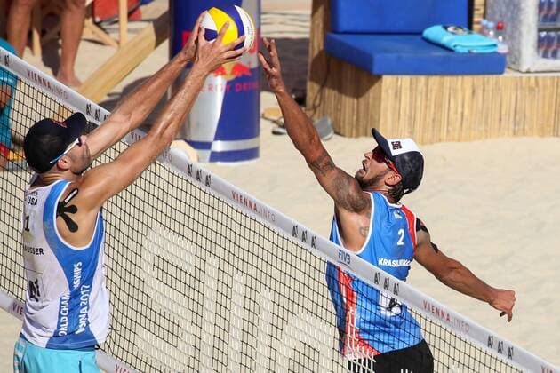 Beach volleyball Beachvolleyball - FIVB World Championships 2017 VIENNA,AUSTRIA,05.AUG.17 - BEACH VOLLEYBALL - FIVB World Championships, men. Image shows Phil Dalhausser (USA) and Viacheslav Krasilnikov (RUS). GEPAxpictures xMaticxKlansek