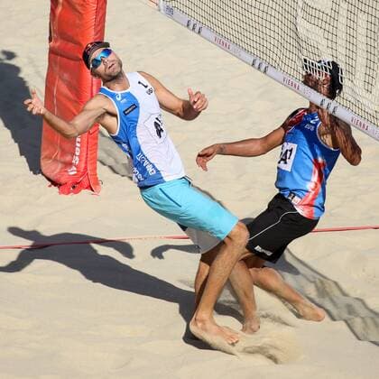 Beach volleyball Beachvolleyball - FIVB World Championships 2017 VIENNA,AUSTRIA,05.AUG.17 - BEACH VOLLEYBALL - FIVB World Championships, men. Image shows Phil Dalhausser (USA) and Viacheslav Krasilnikov (RUS). GEPAxpictures xMaticxKlansek