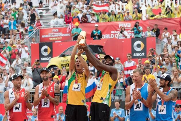 Beach volleyball Beachvolleyball - FIVB World Championships 2017 VIENNA,AUSTRIA,06.AUG.17 - BEACH VOLLEYBALL - FIVB World Championships, men, award ceremony. Image shows the rejoicing of Clemens Doppler and Alexander Horst (AUT), Andre Loyola Stein and Evandro Goncalves Oliveira Junior (BRA) and Nikita Liamin and Viacheslav Krasilnikov (RUS). Keywords: trophy, medals. GEPAxpictures xMaticxKlansek