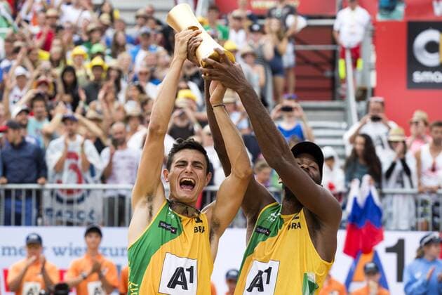 VIENNA, AUSTRIA - AUGUST 06: Andre Loyola Stein and Evandro Goncalves Oliveira Junior of Brazil celebrate after winning the gold medal match during Day 10 of the FIVB Beach volleyball Beachvolleyball World Championships 2017 on August 6, 2017 in Vienna, Austria. (Photo by Michael Kunkel Hoch Zwei) Vienna Austria xHOCHxZWEIx
