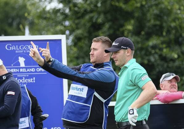 August 10th 2017, Galgorm Castle Golf Club, Galgorm, Northern Ireland; Northern Ireland Open, 1st Round; Scott Henry (SCO) discusses the 1st fairway with his caddy xNigelxCookex  ActionPlus11914081