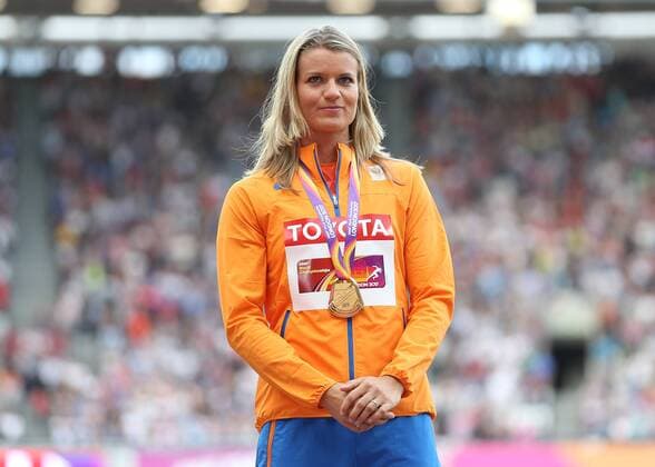 August 12th 2017, London Stadium, East London, England; IAAF World Championships, Day 9; Dafne Scippers of Netherlands with the Gold medal for Women s 200 metres during the medal ceremony xJohnxPatrickxFletcherx  ActionPlus11915491