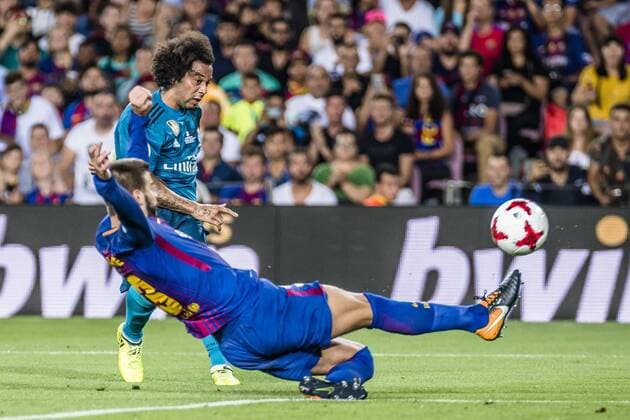August 13, 2017 - Barcelona, Catalonia, Spain - Real Madrid defender MARCELO competes with FC Barcelona Barca defender PIQUE for the ball during the Spanish Super Cup Final 1st leg between FC Barcelona and Real Madrid at the Camp Nou stadium in Barcelona FC Barcelona 1:3 Real Madrid - Spanish Super Cup 2017 - ZUMAo105 20170813_zap_o105_046 Copyright: xMatthiasxOesterlex