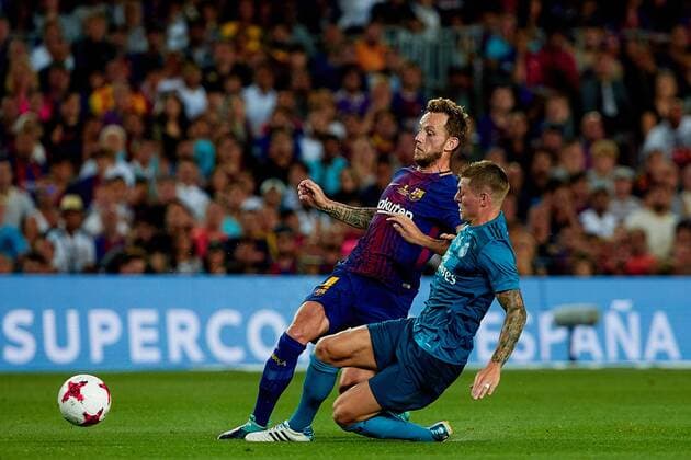 August 13th 2017, Nou Camp, Barcelona, Spain; Spanish Football Supercopa 1st Leg FC Barcelona Barca versus Real Madrid; Ivan Rakitic (L) of FC Barcelona competes for the ball with Kroos of Real Madrid CF; xDavidxAliagax  ActionPlus11916461