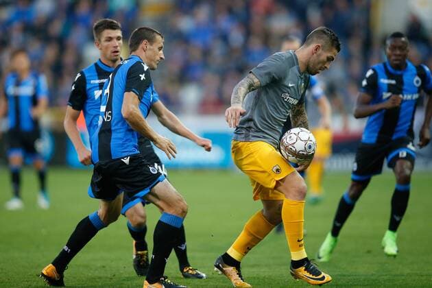 Club s Timmy Simons and AEK s Marko Livaja fight for the ball during a soccer game between Belgian team Club Brugge KSV and Greek club AEK Athens F.C., the first leg of the first playoff round for the UEFA Europa League competition, Thursday 17 August 2017 in Brugge. BRUNOxFAHY  x05149085x