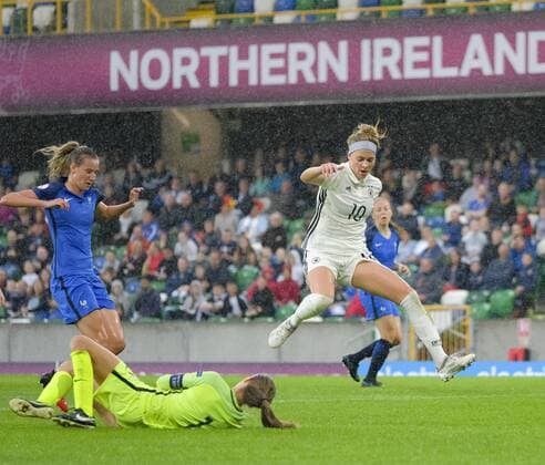 August 17th 2017, Windsor Park, Belfast, Northern Ireland; Womens Under 19s European Championship EM Europameisterschaft Semi Final; Germany Versus France; Laura Freigang of Germany leaps over the onrushing Mylene Chavas of France xNigelxCookex  ActionPlus11917579