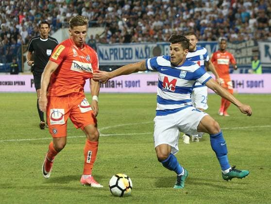 SOCCER - EL quali, Osijek vs A.Wien OSIJEK,CROATIA,17.AUG.17 - SOCCER - UEFA Europa League qualification, NK Osijek vs FK Austria Wien. Image shows Jens Stryger Larsen (A.Wien) and Zoran Lesjak (Osijek). GEPAxpictures xChristianxOrt