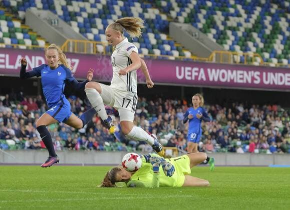 August 17th 2017, Windsor Park, Belfast, Northern Ireland; Womens Under 19s European Championship EM Europameisterschaft Semi Final; Germany Versus France; AnnaLena Rieke of Germany skips over the onrushing Mylene Chavas of France xNigelxCookex  ActionPlus11917635