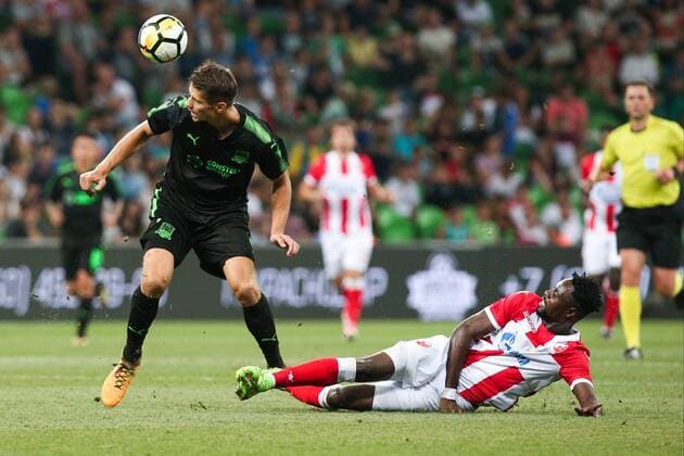 FuÃŸball, EL Quali, FK Krasnodar - Roter Stern Belgrad KRASNODAR, RUSSIA - AUGUST 17, 2017: FC Krasnodar s Alyaksandr Martynovich and Crvena Zvezda Belgrade s Richmond Boakye (L-R front) struggle for the ball in the 2017 2018 UEFA Europa League Playoff 1st Leg football match at Krasnodar Stadium. Vitaly Timkiv TASS  TS05BC64