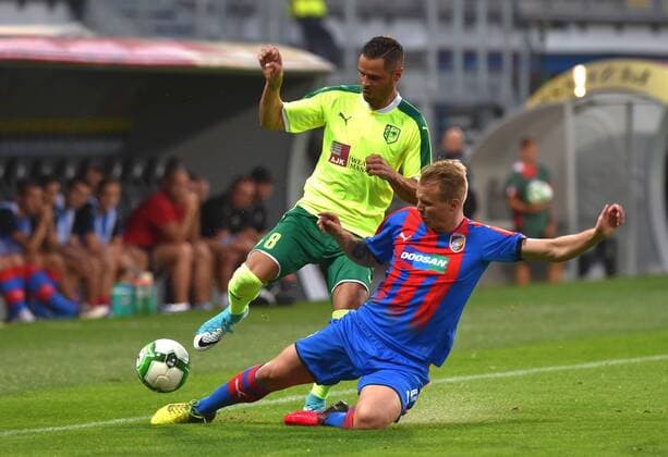 L-R Acoran (Larnaca) and Jan Kopic (Plzen) in action during the 4th round of the play-off UEFA Europa League soccer match FC Viktoria Plzen vs AEK Larnaka in Pilsen, Czech Republic, on August 17, 2017. (CTKxPhoto SlavomirxKubes) CTKPhotoP201708170871401  KBS_0010