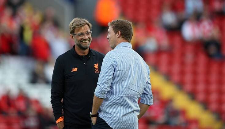 Bilder des Tages - SPORT Jurgen Klopp manager of Liverpool and Julian Nagelsmann manager of 1899 Hoffenheim during the Champions League playoff round at the Anfield Stadium, Liverpool. Picture date 23rd August 2017. Picture credit should read: Lynne Cameron Sportimage EDITORIAL USE ONLY. No use with unauthorised audio, video, data, fixture lists, club league logos or live services. Online in-match use limited to 120 images, no video emulation. No use in betting, games or single club league player publications.
