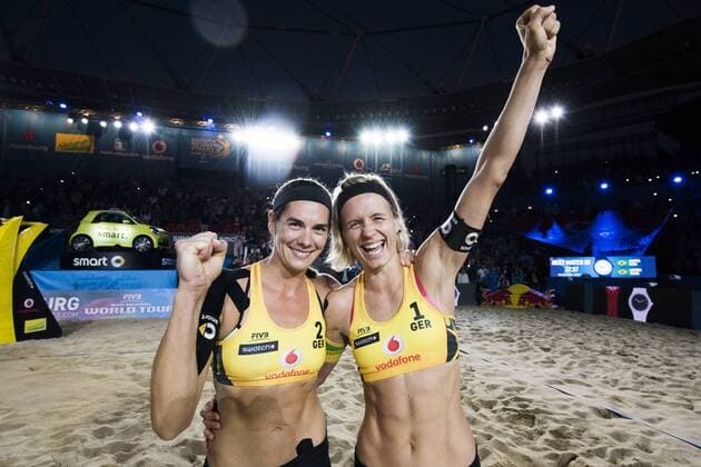 HAMBURG, GERMANY - AUGUST 25: Kira Walkenhorst and Laura Ludwig of Germany celebrate during Day 3 of the Swatch Beach volleyball Beachvolleyball FIVB World Tour Finals Hamburg 2017 on August 25, 2017 in Hamburg, Germany. (Photo by Malte Christians Hoch Zwei) Hamburg Germany xHOCHxZWEIx