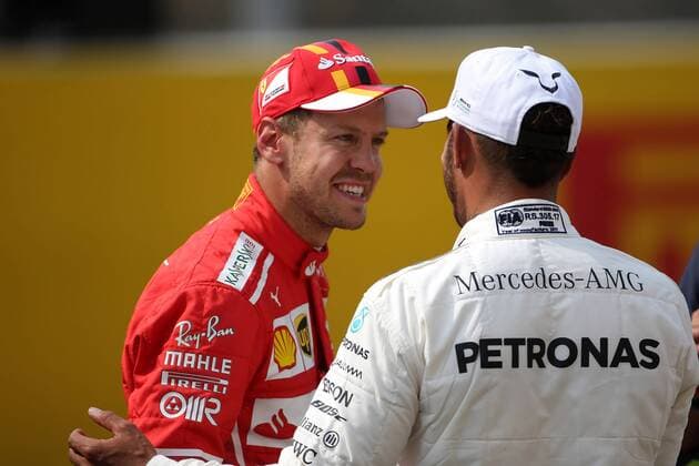 26.08.2017 - Qualifying, 2nd place Sebastian Vettel (GER) Scuderia Ferrari SF70H and Lewis Hamilton (GBR) Mercedes AMG F1 W08 pole position Belgian Grand Prix, Spa-Francorchamps 24 - 27 August 2017 26.08.2017 - Qualifying, 2nd place Sebastian Vettel (GER) Scuderia Ferrari SF70H and Lewis Hamilton (GBR) Mercedes AMG F1 W08 pole position 