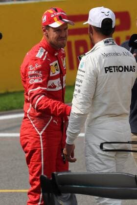 Bilder des Tages - SPORT 26.08.2017 - Qualifying, 2nd place Sebastian Vettel (GER) Scuderia Ferrari SF70H and Lewis Hamilton (GBR) Mercedes AMG F1 W08 pole position Belgian Grand Prix, Spa-Francorchamps 24 - 27 August 2017 26.08.2017 - Qualifying, 2nd place Sebastian Vettel (GER) Scuderia Ferrari SF70H and Lewis Hamilton (GBR) Mercedes AMG F1 W08 pole position 