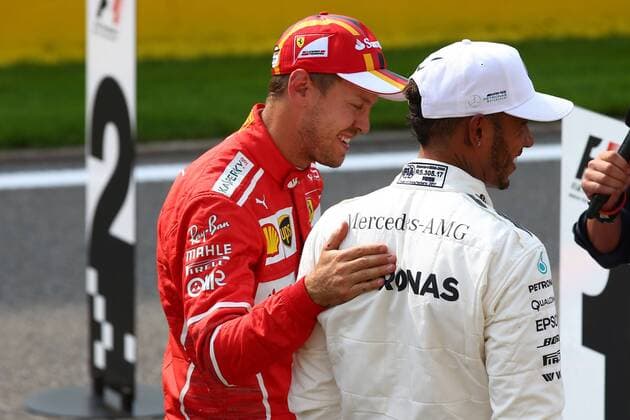 26.08.2017 - Qualifying, 2nd place Sebastian Vettel (GER) Scuderia Ferrari SF70H and Lewis Hamilton (GBR) Mercedes AMG F1 W08 pole position Belgian Grand Prix, Spa-Francorchamps 24 - 27 August 2017 26.08.2017 - Qualifying, 2nd place Sebastian Vettel (GER) Scuderia Ferrari SF70H and Lewis Hamilton (GBR) Mercedes AMG F1 W08 pole position 
