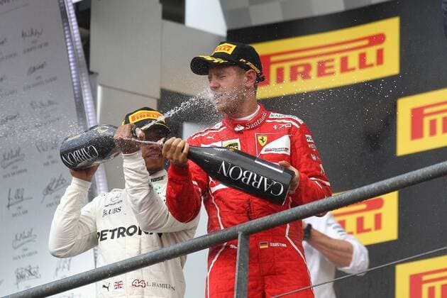Lewis Hamilton (Mercedes AMG Petronas Formula One Team) bespritzt Sebastian Vettel (Scuderia Ferrari) mit Champagner, Grosser Preis von Belgien 2017, Rennen, Motorsport, Formel 1, 27.08.2017, Spa Francorchamps Copyright: xEibner-Pressefoto AlexanderxNeisx EP_ANS