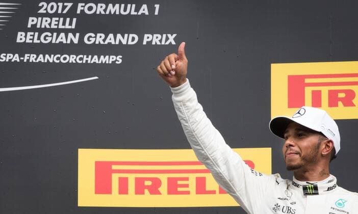 Mercedes British driver Lewis Hamilton celebrates on the podium after winning the Spa-Francorchamps Formula One Grand Prix of Belgium race, in Spa-Francorchamps, Sunday 27 August 2017. BENOITxDOPPAGNE  x05153338x