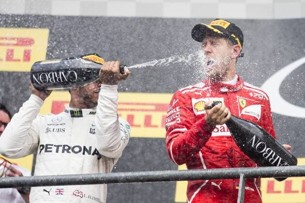 August 27, 2017 - Spa, Belgium - 44 HAMILTON Lewis from Great Britain of team Mercedes GP and 05 VETTEL Sebastian from Germany of scuderia Ferrari on the podium during the Formula One Belgian Grand Prix at Circuit de Spa-Francorchamps on August 27, 2017 in Spa, Belgium. F1 Grand Prix of Belgium - Race  - ZUMAn230 20170827_zaa_n230_174 Copyright: xXavierxBonillax