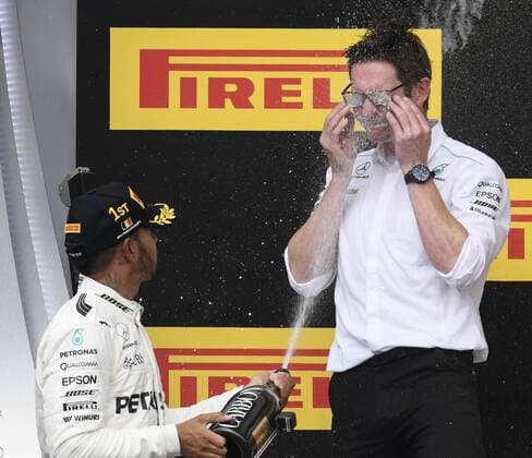 Mercedes British driver Lewis Hamilton and Andy Cowell Managing director of Mercedes AMG celebrate on the podium after the Spa-Francorchamps Formula One Grand Prix of Belgium race, in Spa-Francorchamps, Sunday 27 August 2017. NICOLASxLAMBERT  x05153453x