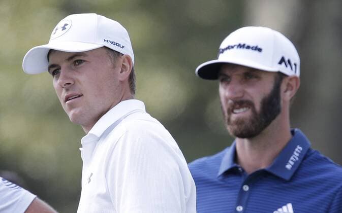 Jordan Spieth and Dustin Johnson stand on the second hole tee box when they are paired together in the final group in the final round of The Northern Trust golf championship at the Glen Oaks Club in Old Westbury, New York on August 27, 2017. Glen Oaks Club is hosting THE NORTHERN TRUST for the first time.  NYP20170827112 JOHNxANGELILLO
