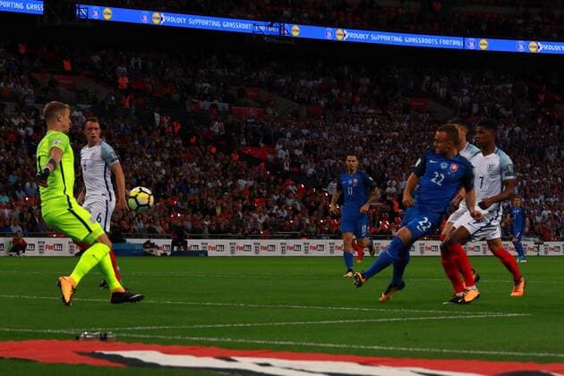 Stanislav Lobotka (S) scores the first Slovakia goal past Joe Hart (E) (0-1) at the England v Slovakia 2018 FIFA World Cup WM Weltmeisterschaft Fussball Qualifier, at Wembley Stadium, London on September 4, 2017. 