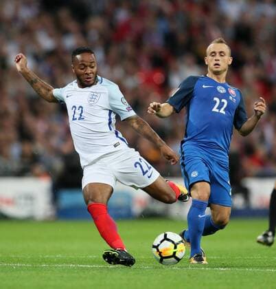 England s Raheem Sterling tussles with Slovakia s Stanislav Lobotka during the World Cup Qualifier match at Wembley Stadium, London. Picture date 4th September 2017. Picture credit should read: David Klein Sportimage EDITORIAL USE ONLY. No use with unauthorised audio, video, data, fixture lists, club league logos or live services. Online in-match use limited to 120 images, no video emulation. No use in betting, games or single club league player publications.