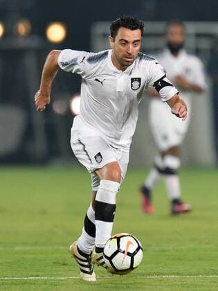 (170910) -- DOHA, Sept. 10, 2017 -- Al-Sadd s Xavi controls the ball during their Sheikh Jassim Super Cup soccer tournament final match against Al Duhail at the Al Duhail Stadium in Doha, capital of Qatar, on Sept. 9, 2017. Al-Sadd defeated Al Duhail 4-2 to claim the title. ) (SP)QATAR-DOHA-SOCCER-SUPER CUP-FINAL Nikku 