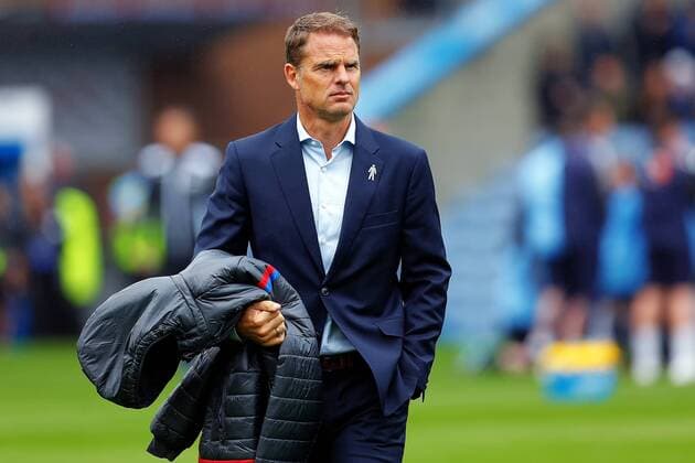 10th September 2017, Turf Moor, Burnley, England; EPL Premier League football, Burnley versus Crystal Palace; Crystal Palace Manager Frank de Boer carries his coat conscious that his job may be at stake if the result does not go his way today  ActionPlus11929198