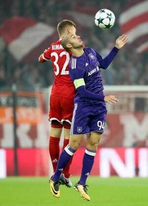 Bayern s Joshua Kimmich and Anderlecht s Sofiane Hanni fight for the ball during a soccer game between German team FC Bayern Munich and Belgian club RSC Anderlecht, Tuesday 12 September 2017 in Munich, Germany, the first game in the group stage (Group B) of the UEFA Champions League competition. VIRGINIExLEFOUR  x05163658x