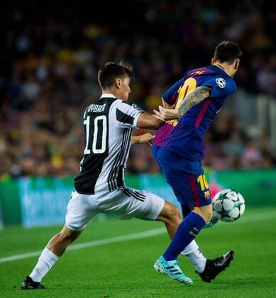 12th September 2017, Camp Nou, Barcelona, Spain; UEFA Champions League Group stage, FC Barcelona Barca versus Juventus; Leo Messi of FC Barcelona and Paulo Dybala of Juventus fight the ball  ActionPlus11929425