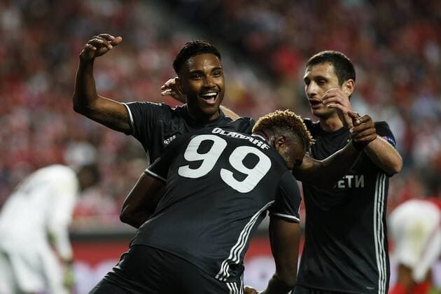 September 12, 2017 - Lisbon, Portugal - CSKA s forward Vitinho (L) celebrates his goal with CSKA s forward Aaron Olanare (C) and CSKA s midfielder Alan Dzagoev (R) during Champions League 2017 18 match between SL Benfica vs CSKA Moscow, in Lisbon, on September 12, 2017. SL Benfica v CSKA Moskva - UEFA Champions League  - ZUMAn230 20170912_zaa_n230_250 Copyright: xCarlosxPalmax