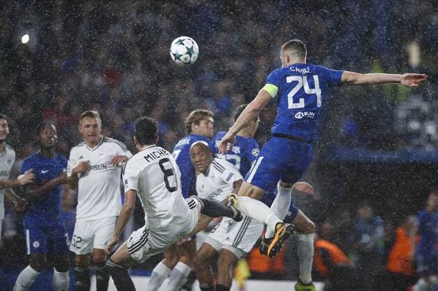 (170913) -- LONDON, Sept. 13, 2017 -- Gary Cahill (Above) of Chelsea heads for the ball during the UEFA Champions League Group C match between Chelsea and Qarabag FK at Stamford Bridge Stadium in London, Britain on Sept. 12, 2017. Chelsea won 6-0. ) (SP)BRITAIN-LONDON-FOOTBALL-UEFA CHAMPIONS LEAGUE-CHELSEA VS QARABAG FK HanxYan 