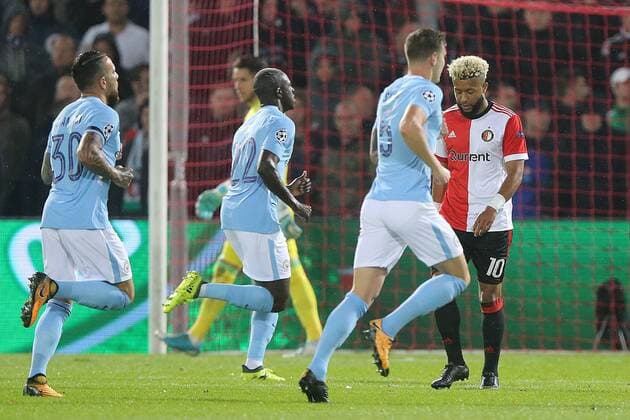 Nicolas Otamendi of Manchester City, Benjamin Mendy of Manchester City, John Stones of Manchester City Tonny Vilhena of Feyenoord during the UEFA Champions League group F match between Feyenoord Rotterdam and Manchester City at the Kuip on September 13, 2017 in Rotterdam, The Netherlands UEFA Champions League 2017 2018 xVIxVIxImagesx xTomxBodexMultimediaxIVx 8734793