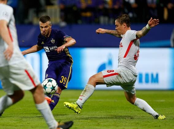 SOCCER - CL, Maribor vs Spartak MARIBOR,SLOVENIA,13.SEP.17 - UEFA Champions League, group stage, NK Maribor vs FK Spartak Moscow. Image shows Damjan Bohar (Maribor) scoring a goal against Andrei Eschenko (Spartak). GEPAxpictures xDavidxRodriguez