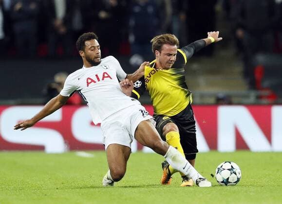 Tottenham s Mousa Dembele tussles with Dortmund s Mario Gotze during the champions league match at Wembley Stadium, London. Picture date 13th September 2017. Picture credit should read: David Klein Sportimage EDITORIAL USE ONLY. No use with unauthorised audio, video, data, fixture lists, club league logos or live services. Online in-match use limited to 120 images, no video emulation. No use in betting, games or single club league player publications.