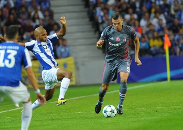 Pepe (L) of Besiktas and Yacine Brahimi of Porto during the UEFA Champions League match between Porto and Besiktas at Estadio do Dragao Stadium in Porto , Portugal on September 13 , 2017. Final Scores : Porto 1 - Besiktas 3 