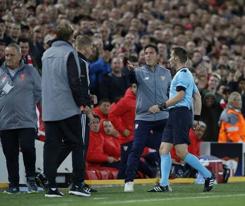 As he is sent off Eduardo Berizzo manager of Sevilla reacts to Jurgen Klopp manager of Liverpool during the Champions League Group E match at the Anfield Stadium, Liverpool. Picture date 13th September 2017. Picture credit should read: Simon Bellis Sportimage EDITORIAL USE ONLY. No use with unauthorised audio, video, data, fixture lists, club league logos or live services. Online in-match use limited to 120 images, no video emulation. No use in betting, games or single club league player publications.