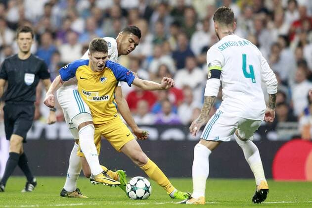 Real Madrid s Carlos Henrique Casemiro (l) and Sergio Ramos (r) and Apoel FC s Roland Sallai during Champions League Group H match 1. September 13,2017.  (20170913152)