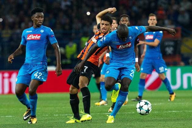 Player Taison (FC Shakhtar) and players Kalidou Koulibaly and Amadou Diawara (S.S.C. Napoli) Donetsk  Copyright: ChumachenkoxAlexey 508981