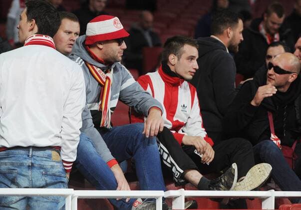 Football - 2017 2018 Europa League - Group H: Arsenal vs. FC Koln Koln fans sit in the stadium after hearing the game has been delayed by one hour, at The Emirates. COLORSPORT ANDREW COWIE 
