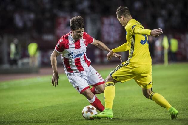 14th September 2017, Red Star Stadium, Belgrade, Serbia; UEFA Europa League Group stage, Red Star Belgrade versus BATE; Defender Filip Stojkovic of Red Star Belgrade challenged by Denis Polyakov  ActionPlus11930034