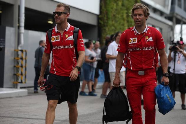 15.09.2017 - Sebastian Vettel (GER) Scuderia Ferrari SF70H and Antti Kontsas (FIN) Sebastian Vettel Personal Trainer Singapore Grand Prix 14 - 17 September 2017 15.09.2017 - Sebastian Vettel (GER) Scuderia Ferrari SF70H and Antti Kontsas (FIN) Sebastian Vettel Personal Trainer 
