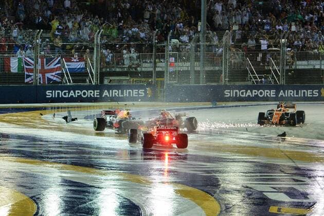 (170917) -- SINGAPORE, Sept. 17, 2017 -- McLaren Honda s Spanish driver Fernando Alonso (Front) crashes with Red Bull Racing Tag Heuer s Dutch driver Max Verstappen (1st L) and Ferrari s Kimi Raikkonen of Finland during the Formula One Singapore Grand Prix in Singapore on Sept. 17, 2017. ) (wll) (SP)SINGAPORE-FORMULA ONE-SINGAPORE GRAND PRIX-RACE ThenxChihxWey 