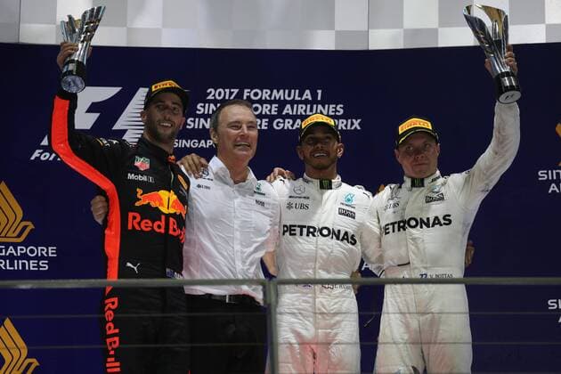 Singapore Grand Prix 14 - 17 September 2017 17.09.2017 - Race, 2nd place Daniel Ricciardo (AUS) Red Bull Racing RB13, Lewis Hamilton (GBR) Mercedes AMG F1 W08 race winner and 3rd place Valtteri Bottas (FIN) Mercedes AMG F1 W08 