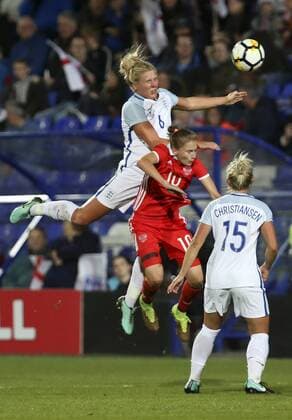 19th September 2017, Prenton Park, Birkenhead, England; Womens World Cup Qualifying, group 1; England Women versus Russia Women; Millie Bright of England leaps to win the header challenged by Nadezhda Smirnov of Russia  ActionPlus11932399