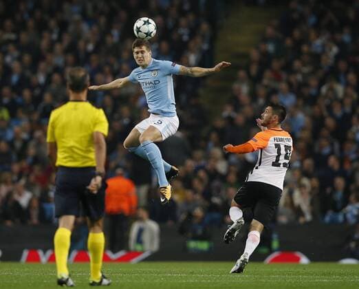 John Stones of Manchester City rises high to clear the ball during the Champions League Group F match at the Emirates Stadium, Manchester. Picture date: September 26th 2017. Picture credit should read: Andrew Yates Sportimage EDITORIAL USE ONLY. No use with unauthorised audio, video, data, fixture lists, club league logos or live services. Online in-match use limited to 120 images, no video emulation. No use in betting, games or single club league player publications.